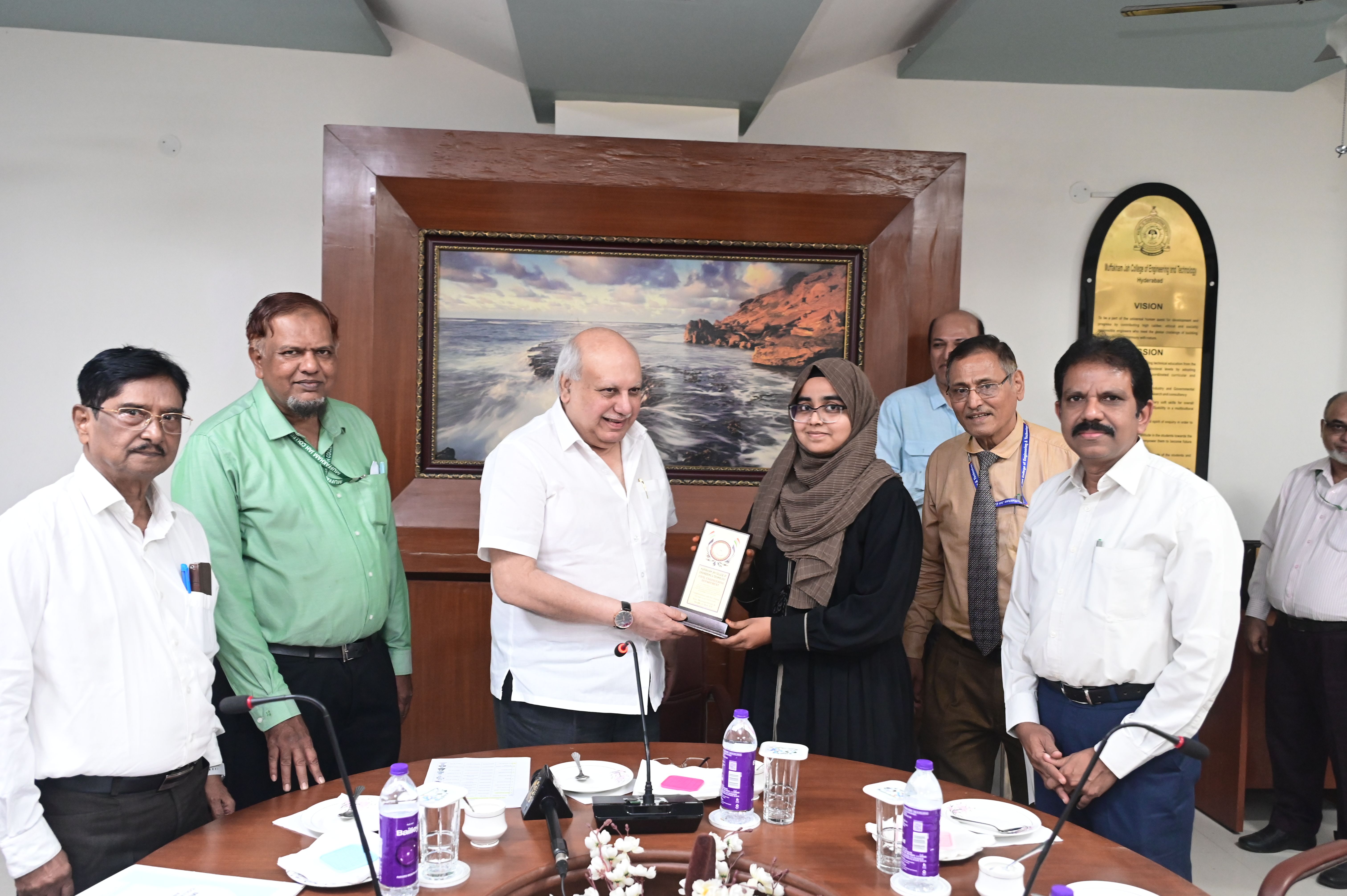 Ms. Nadiya Ishrath, TPBO receiving memento from Hon. Secretary Janab Zafar Javeed, SUES